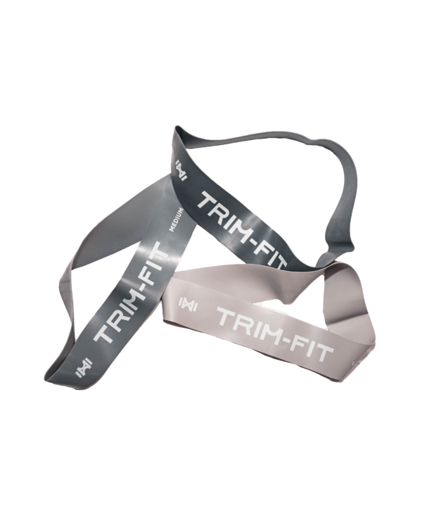 Drei graue TRIM-FIT-Widerstandsbänder mit verschiedenen Schattierungen und den Bezeichnungen mittel und schwer.