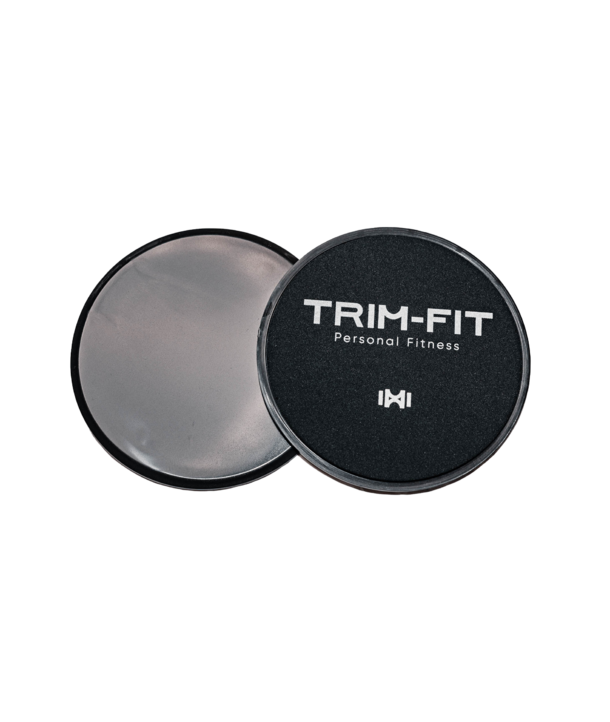 Zwei runde Übungsschieber, einer davon mit dem TRIM-FIT Personal Fitness Logo, auf weißem Hintergrund.